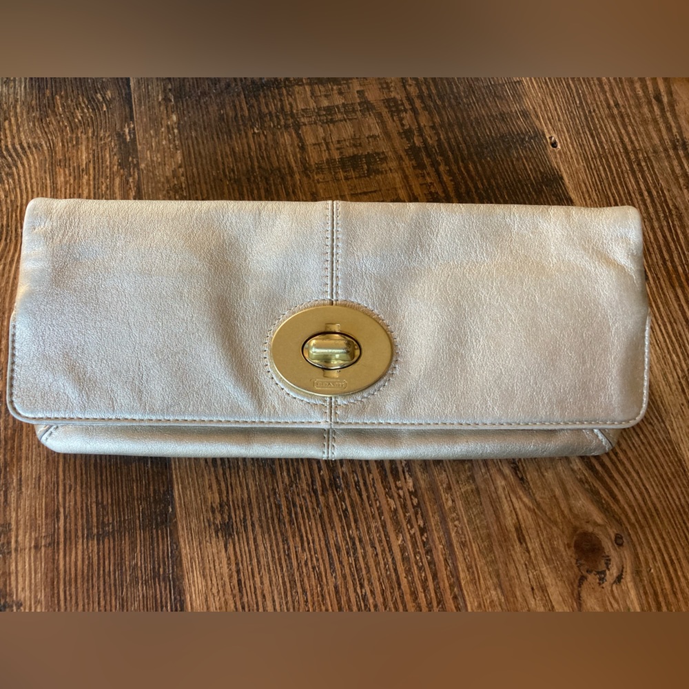Coach fold-over pale gold leather turnlock clutch